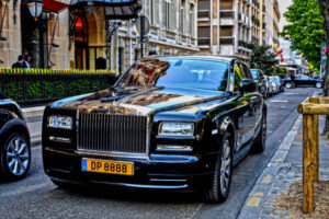 Rolls-Royce luxury sedan with signature grille and Spirit of Ecstasy emblem